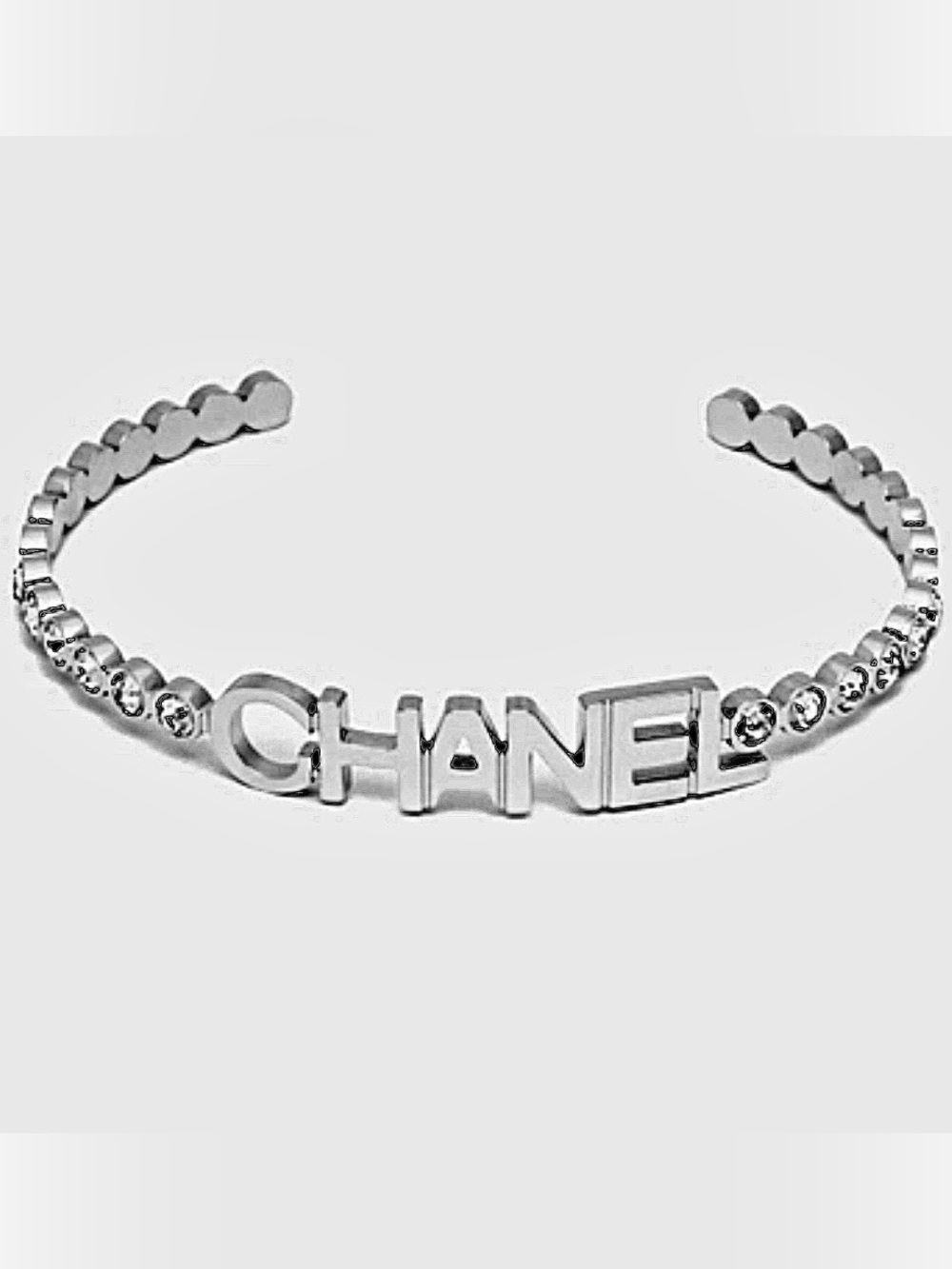 CHANEL Style Silver-Tone Logo Cuff Bracelet with Crystal Accents